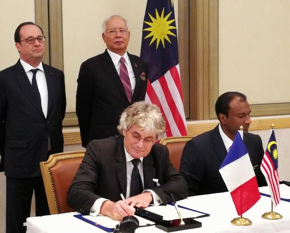 French President F. Hollande and the Prime Minister of Malaysia attend the signing of the cooperation platform (© CIRAD)